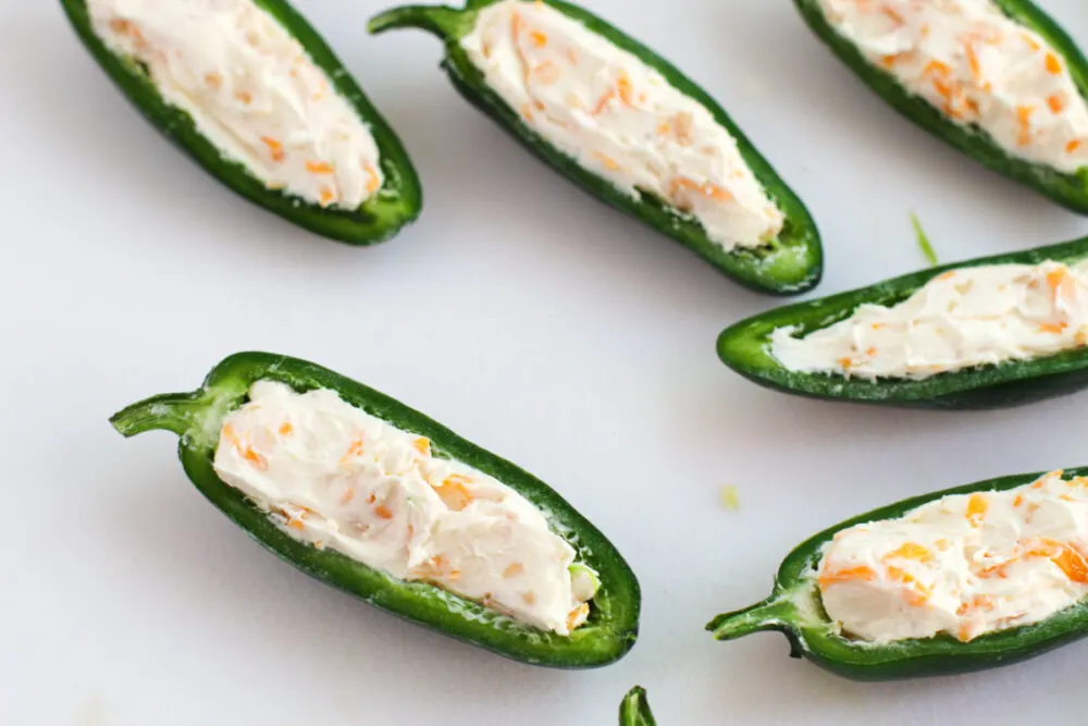 Sliced jalepenos stuffed with cream cheese. 
