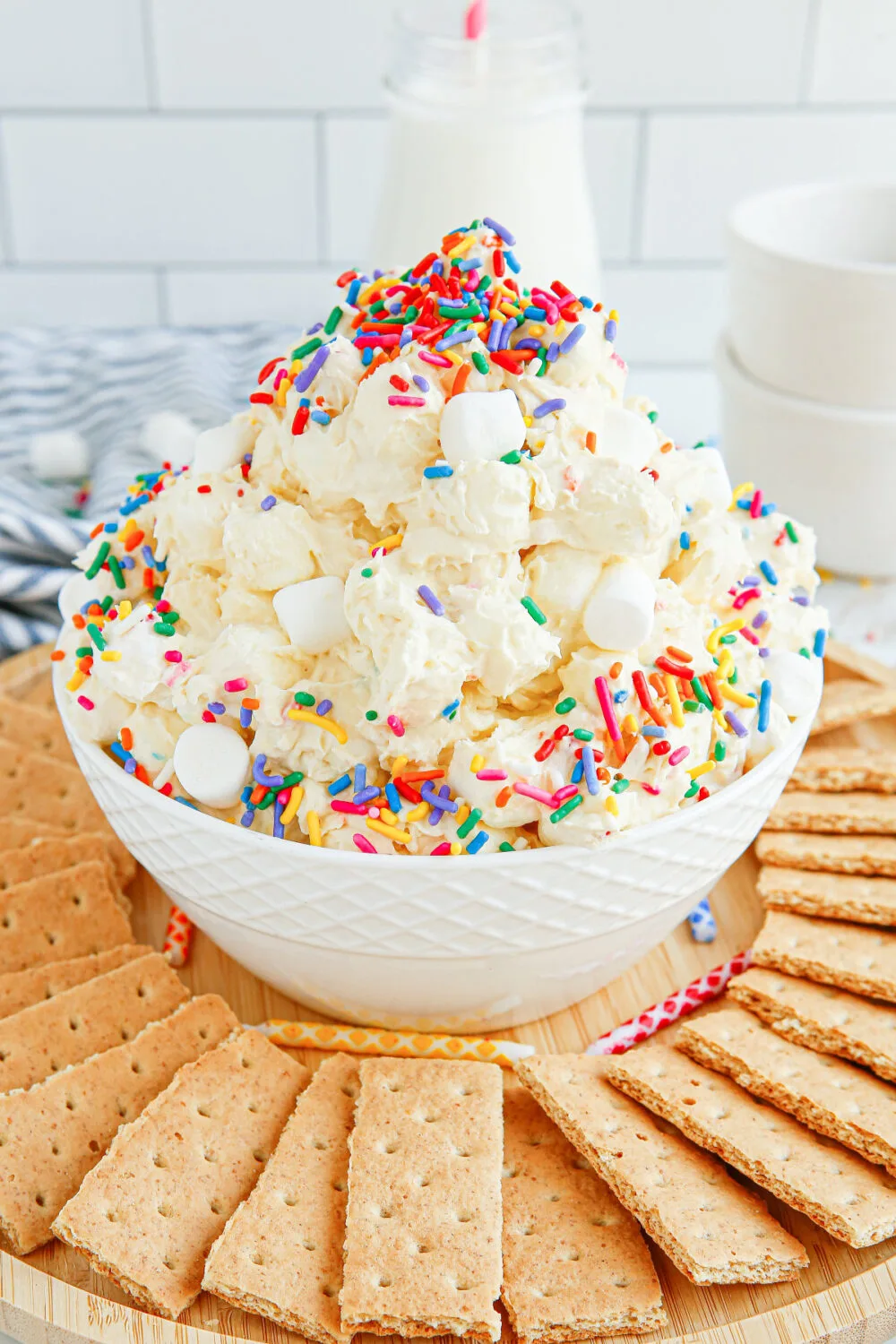 Marshmallow fluff salad with sprinkles and graham crackers. 