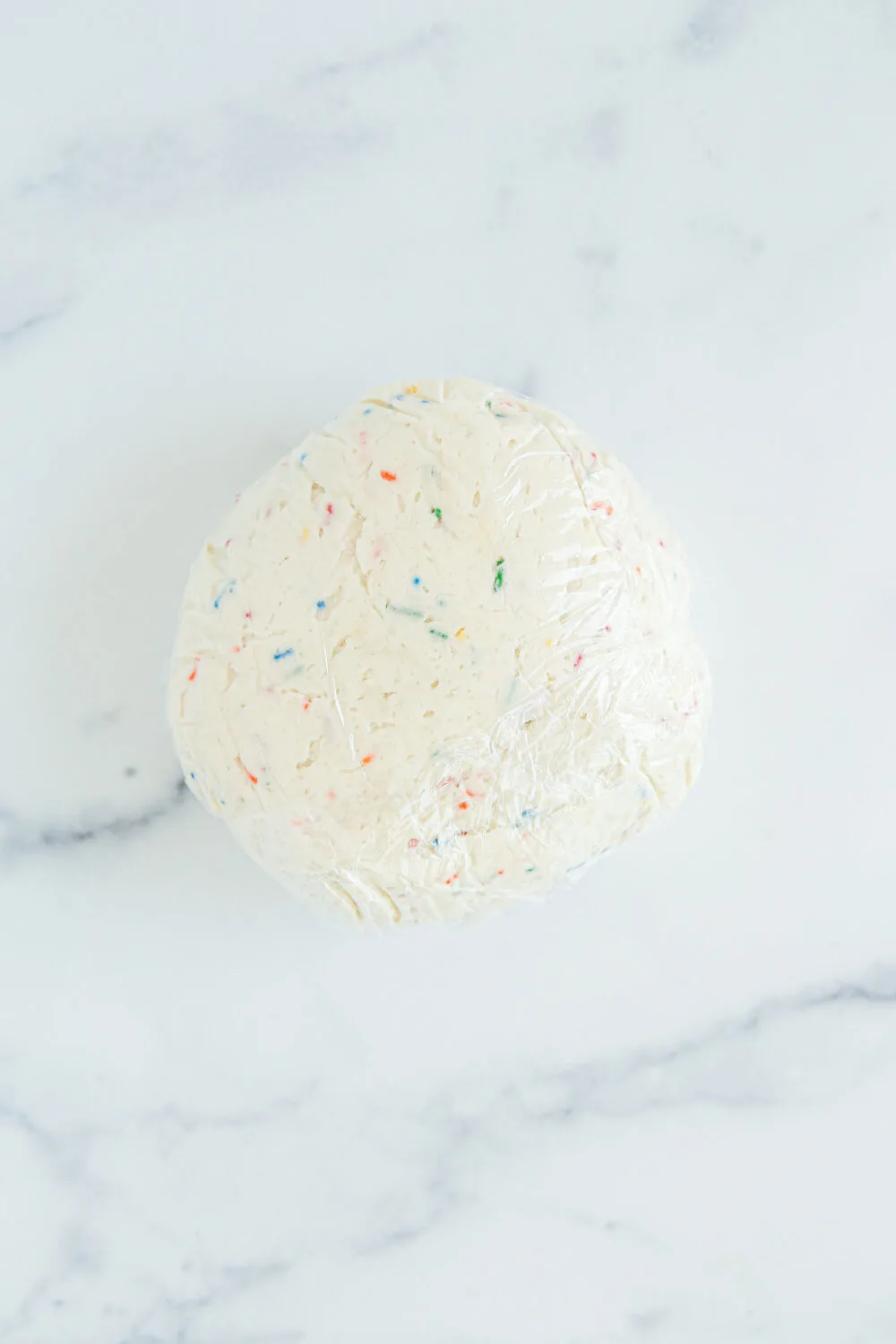 Wrapped ball of cream cheese fufetti dip. 