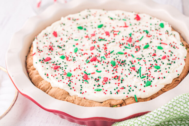 Holiday sugar cookie pie with red and green sprinkles.