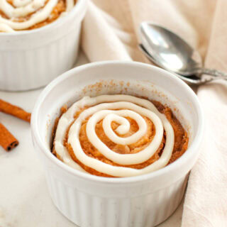 Cinnamon roll cake in a ramekin dish.