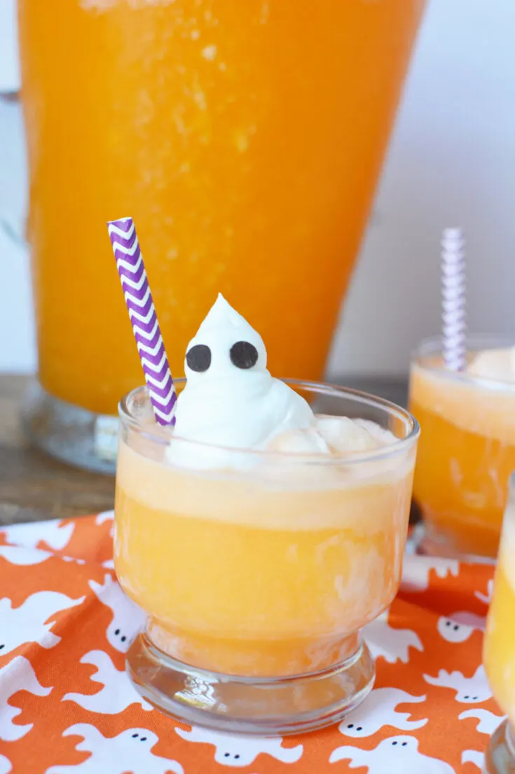 Orange spooky punch with ghosts toppings.