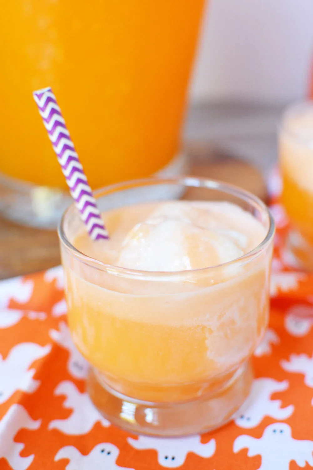 Orange punch and ice cream in a cup. 