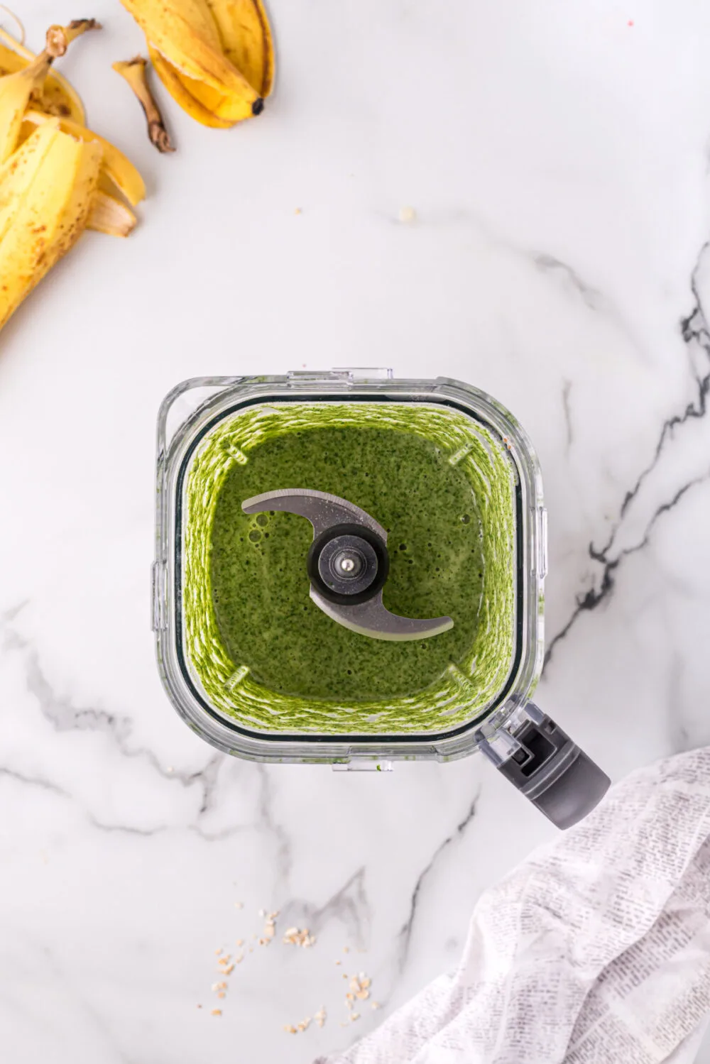 Blended spinach mixture in a blender. 