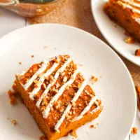 Slice of pumpkin snack cakes on a plate.