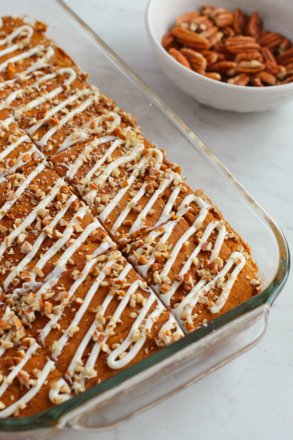 Baking dish with pumpkin cake in it. 