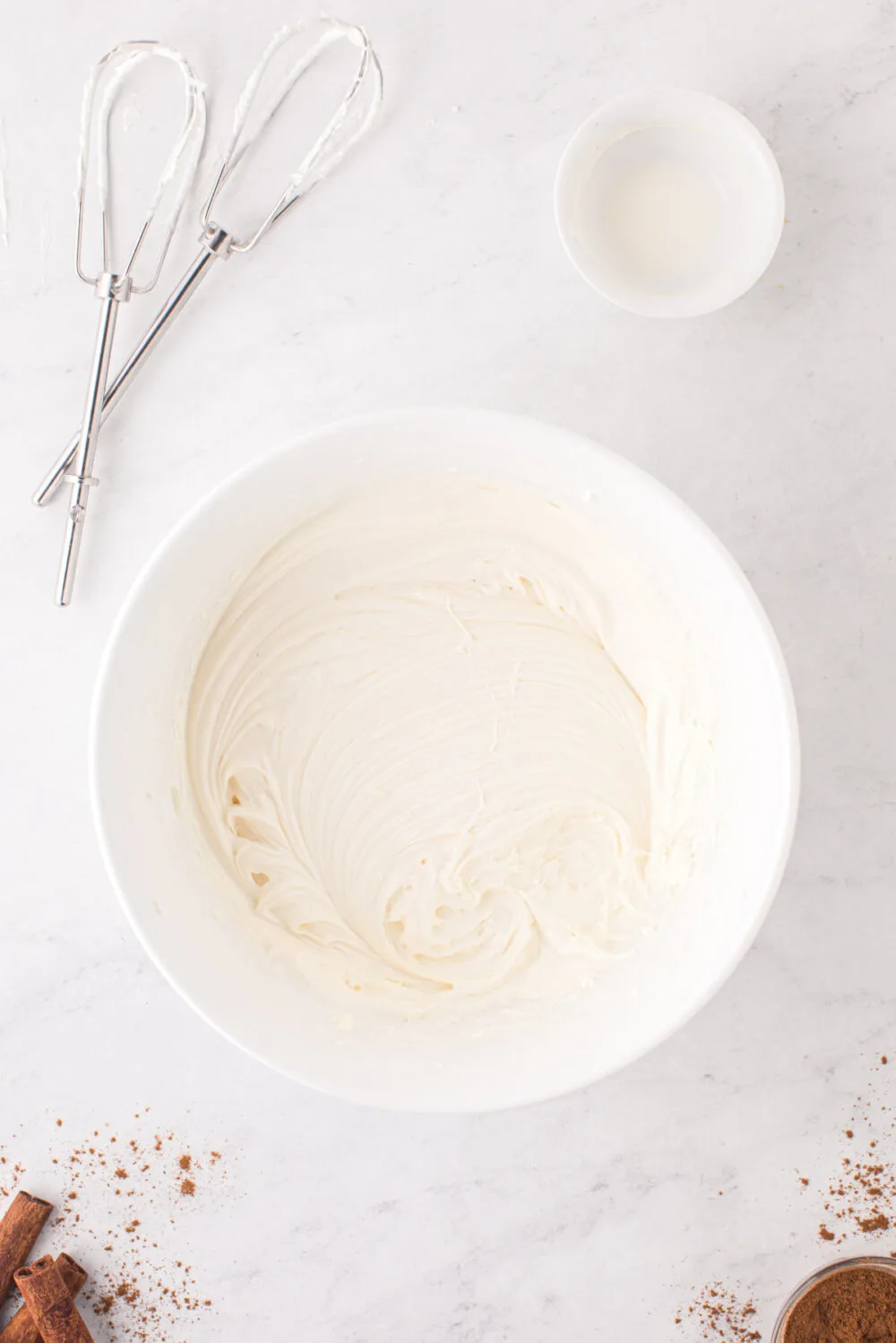 Cream cheese cookie icing in a mixing bowl.