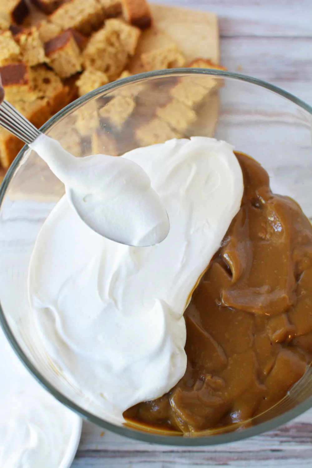 Cool Whip on top of pudding in a trifle. 