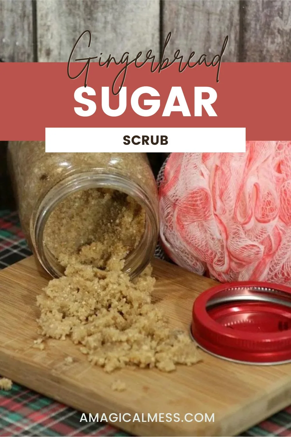 Brown sugar scrub falling out of a jar next to the lid and a pink bath pouf. 