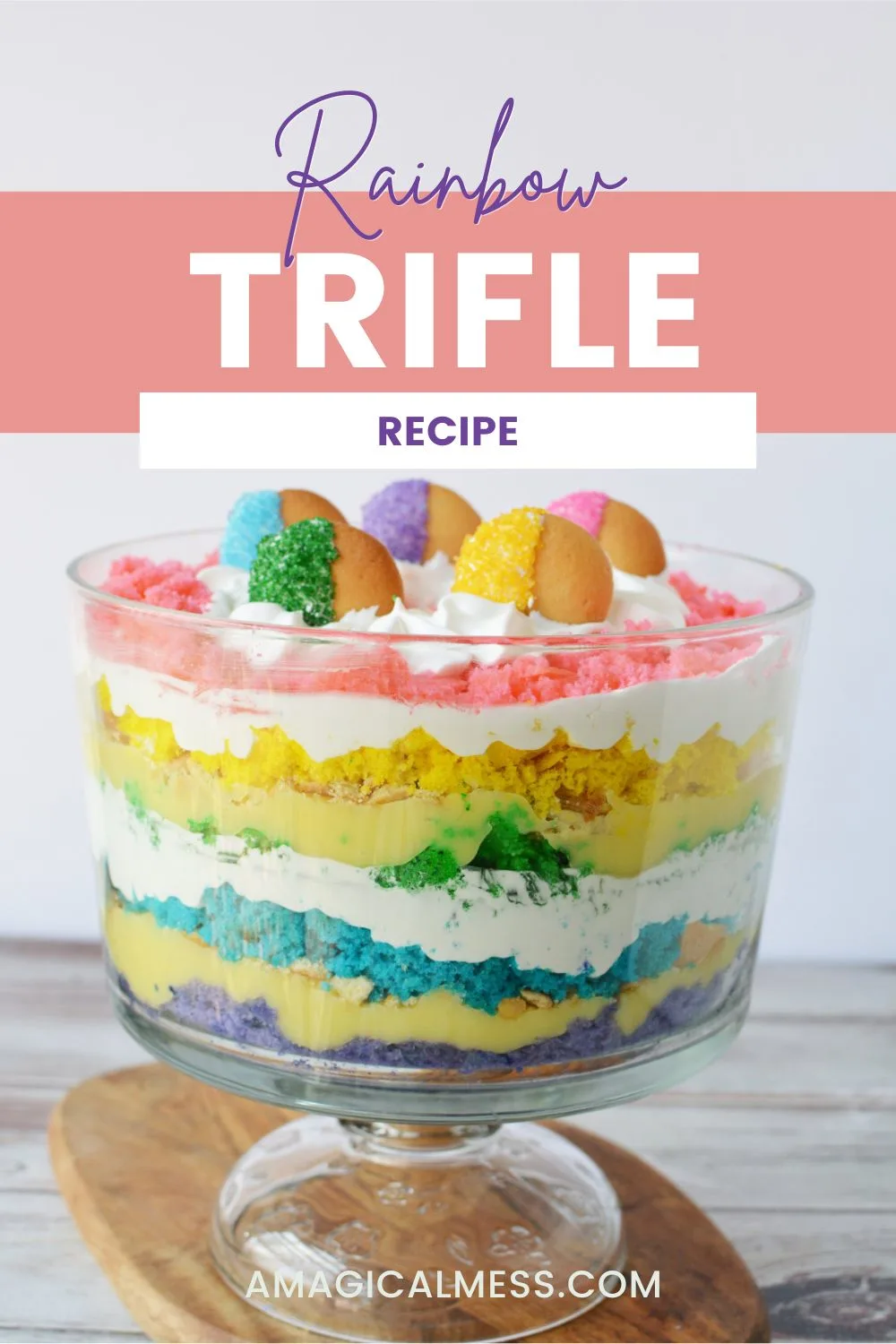 Layers of rainbow cake in a trifle.