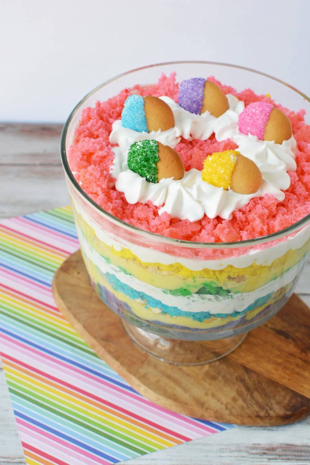 Rainbow cake trifle in a bowl. 
