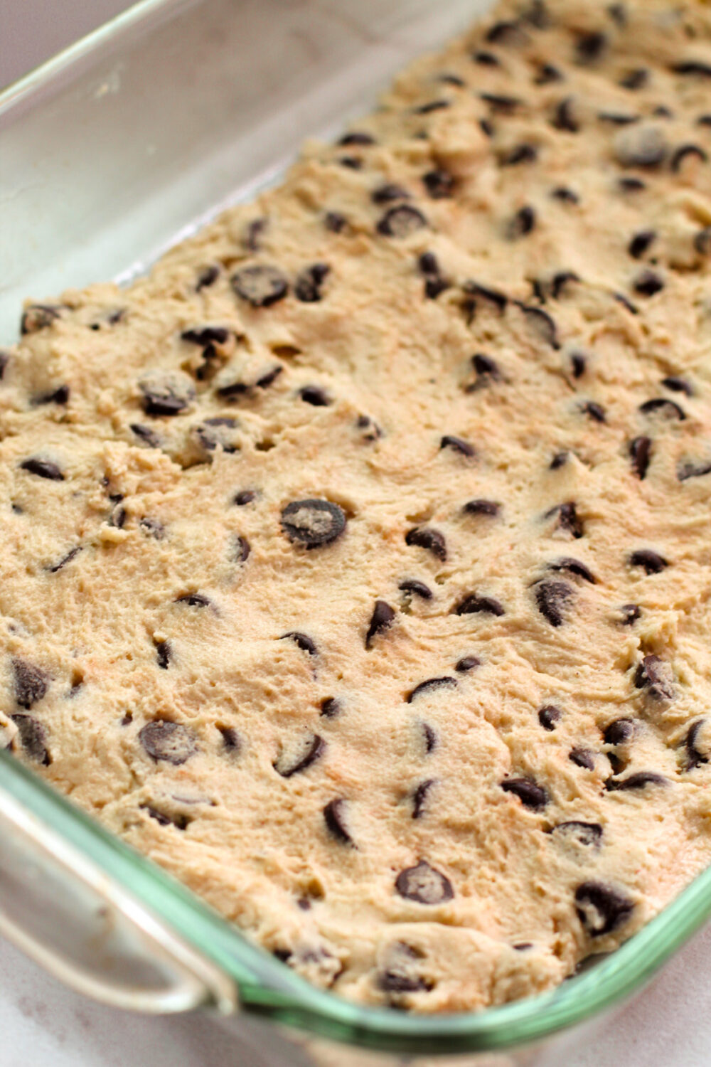 Cookie dough in a baking pan. 