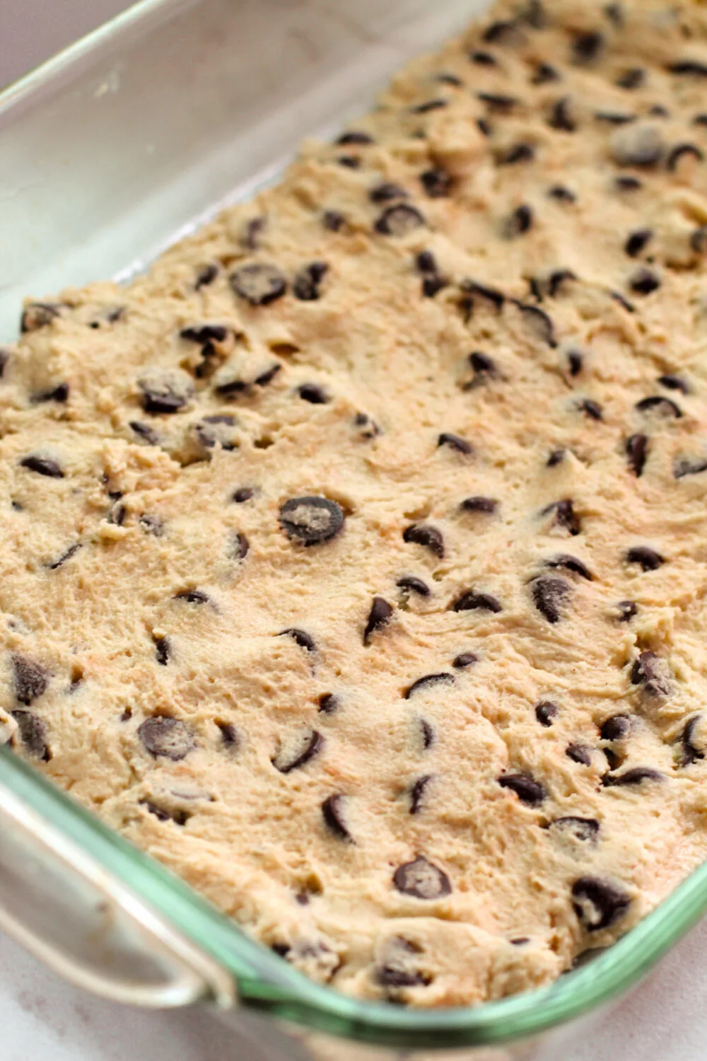 Cookie dough in a baking pan. 