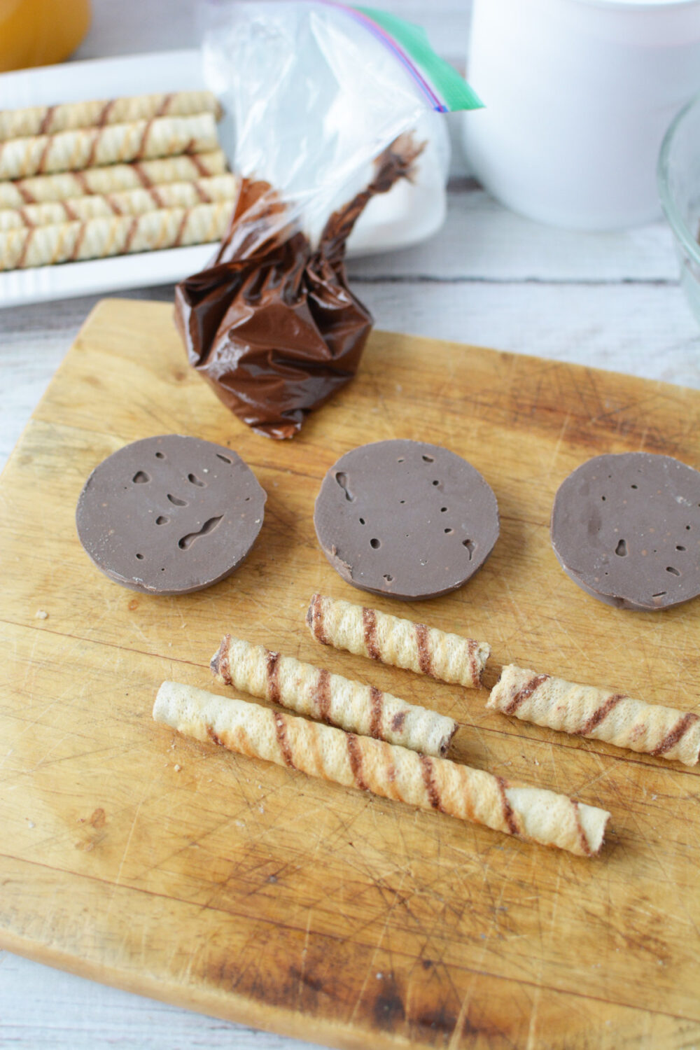 Cookies and wafers on a board. 