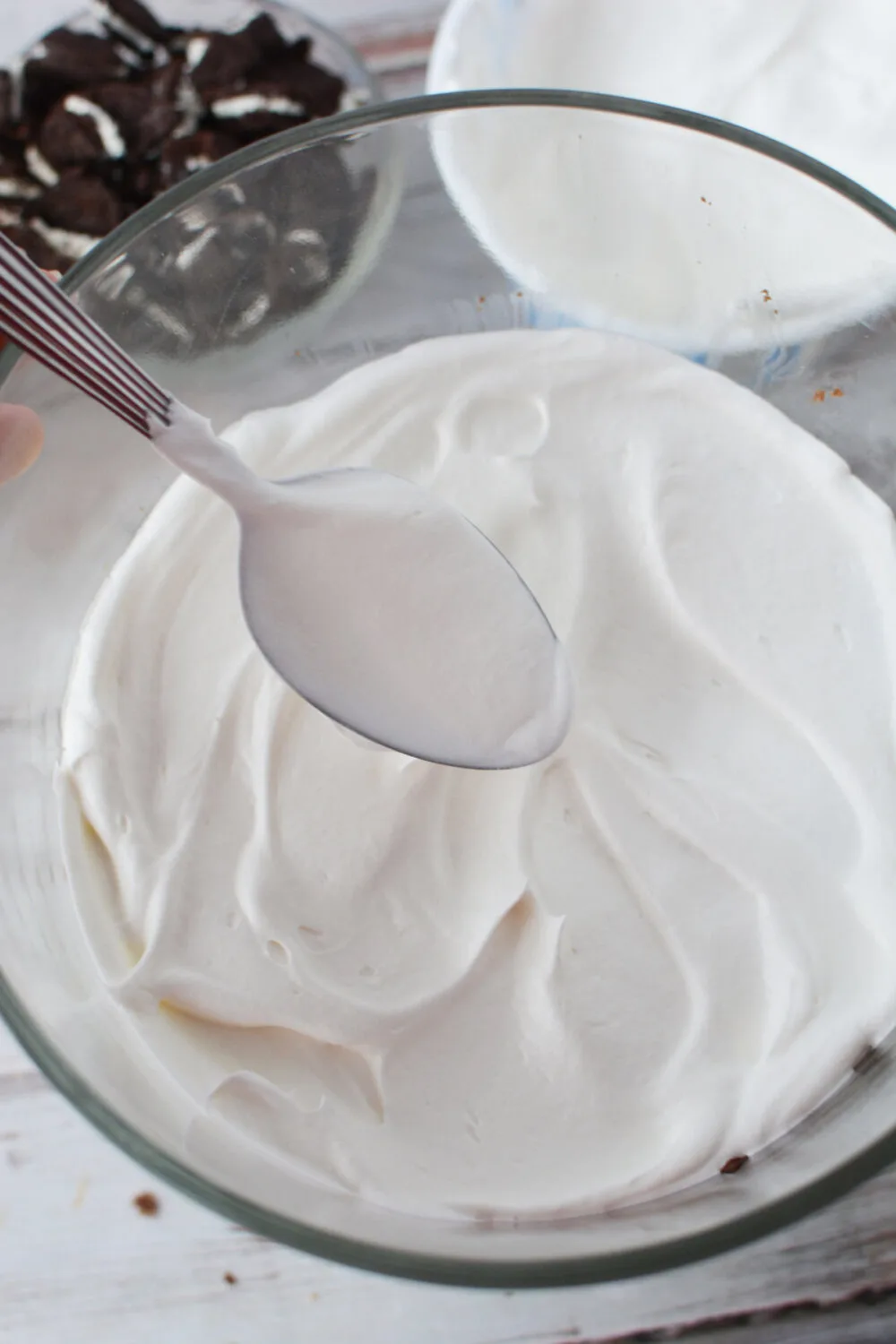 Whipped cream in a trifle dish.