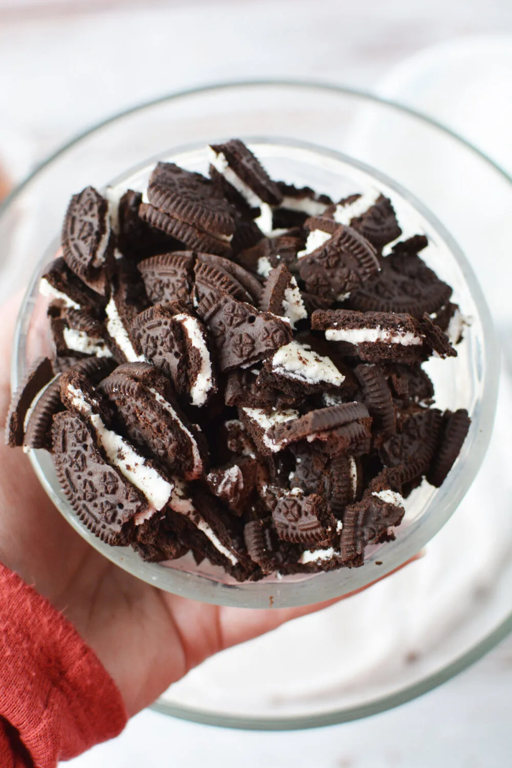 Chunks of OREO cookies in a bowl. 