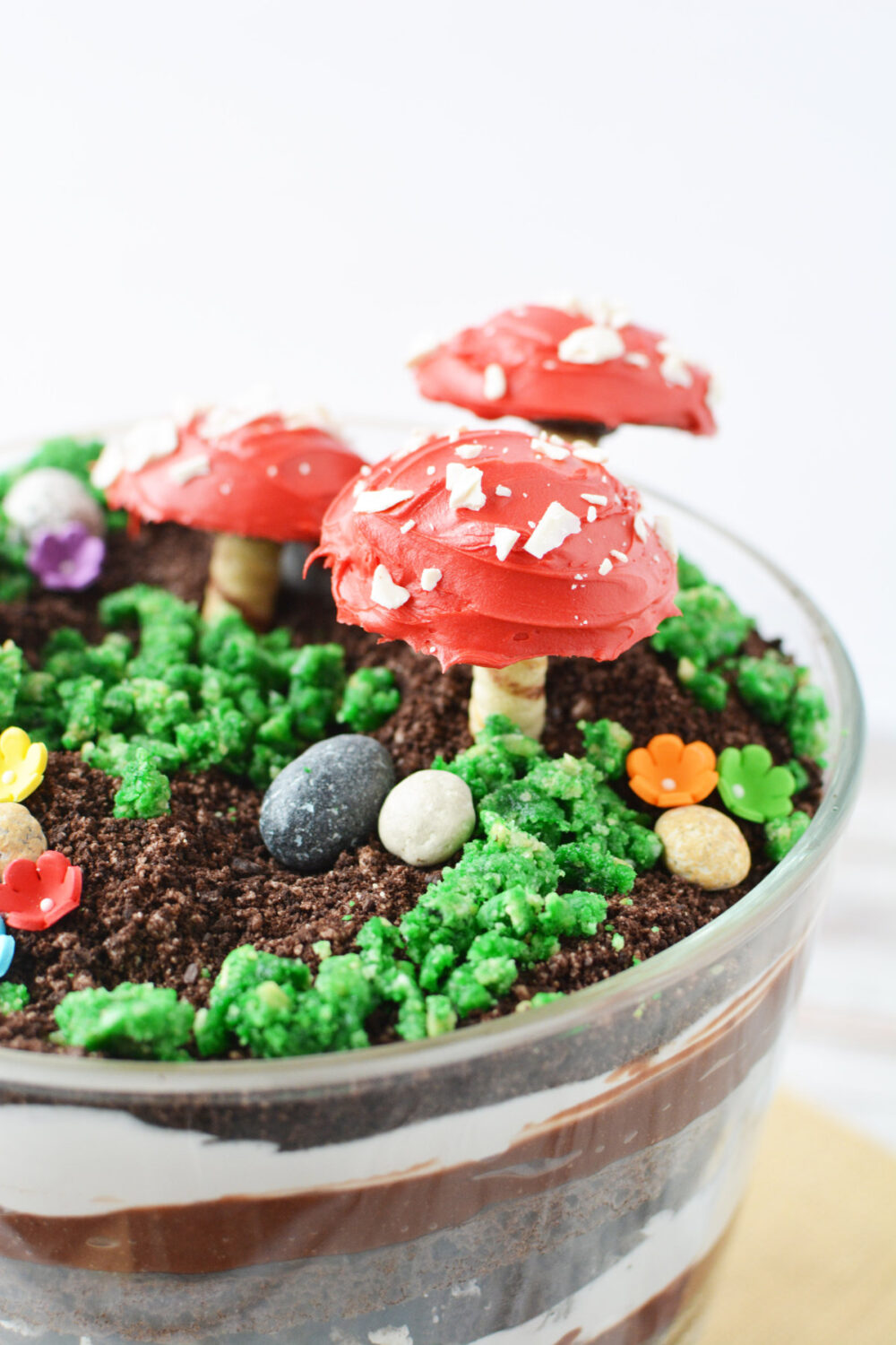 Cookie toadstools sticking out of an Oreo cookie trifle. 