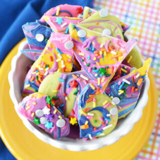 Bowl full of rainbow bark candy.