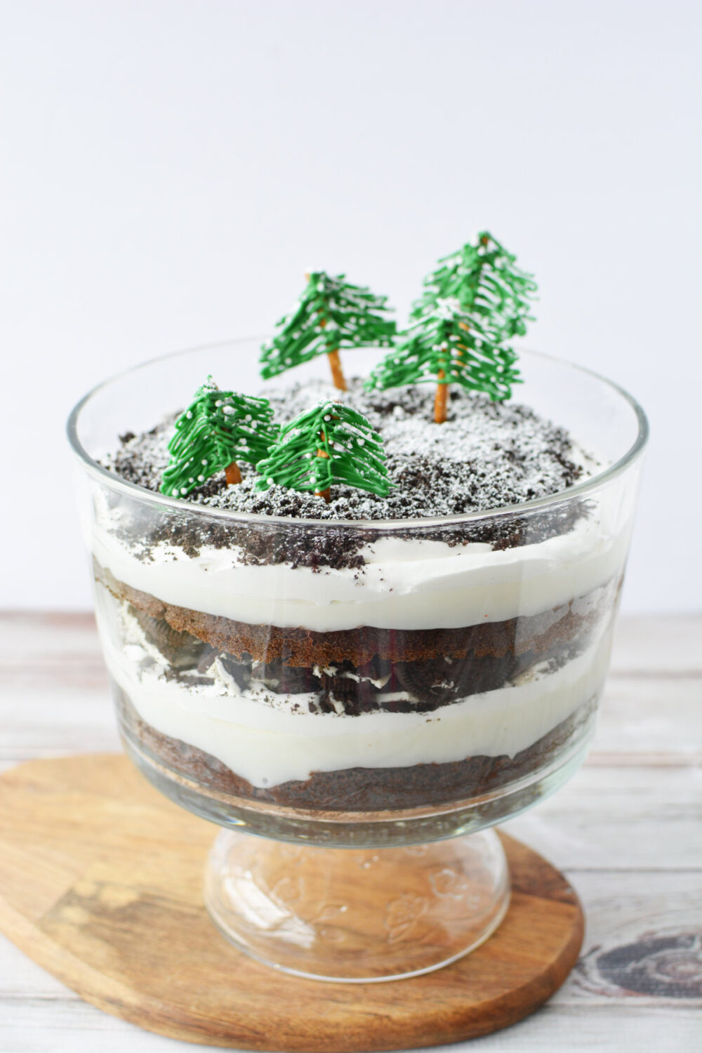 Winter trifle with edible green trees on top.
