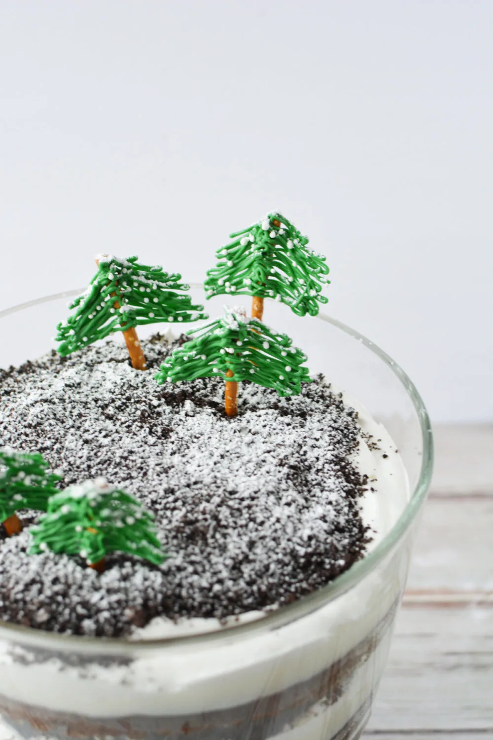 Edible evergreen trees on top of a chocolate winter trifle. 