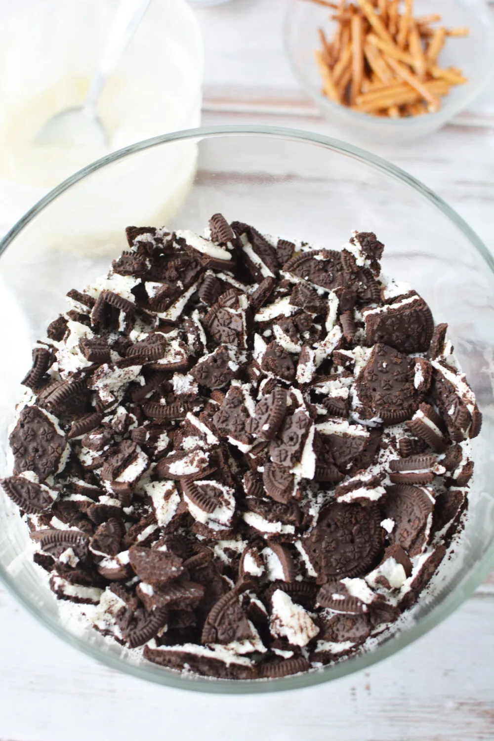 Pieces of oreo cookies in a layer of a chocolate trifle. 