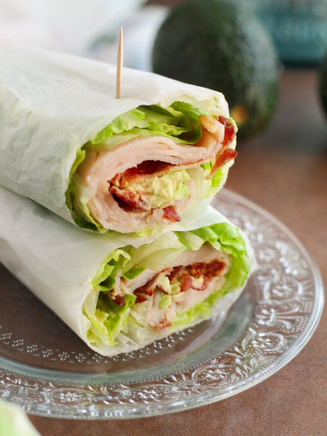 Two turkey wraps stacked on top of each other.