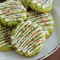 Lime cake mix cookies with sprinkles on a plate.