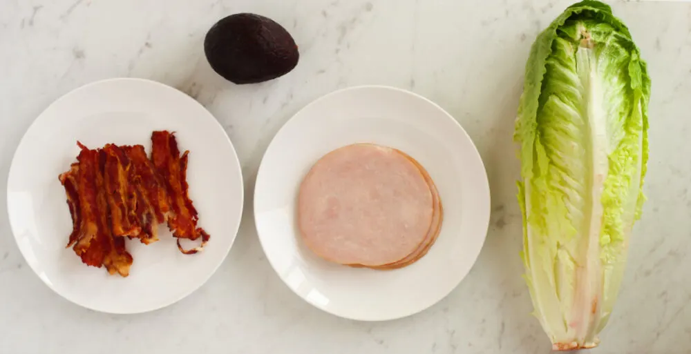 Lettuce, turkey, bacon, and avocado. 