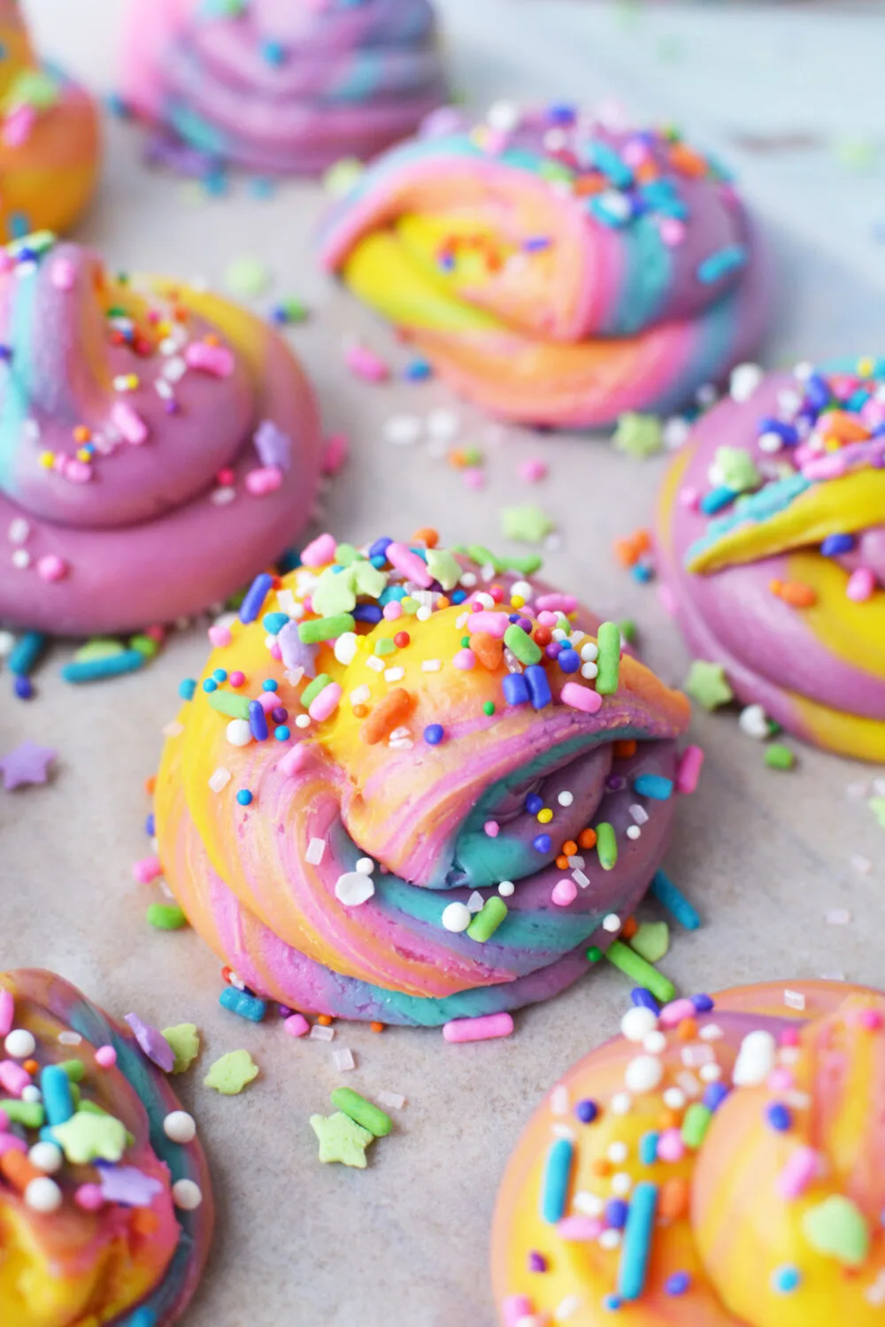 Closeup of unicorn poop fudge topped with sprinkles. 
