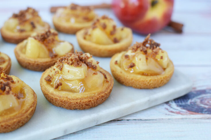 Mini Apple Pie cookies on a board.