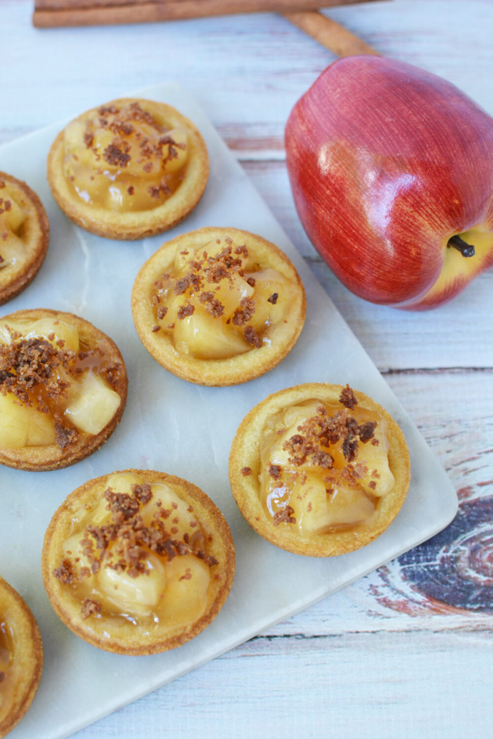 Apple pie cookies with crumble topping on a board. 