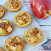 Apple pie cookies with crumble topping on a board.