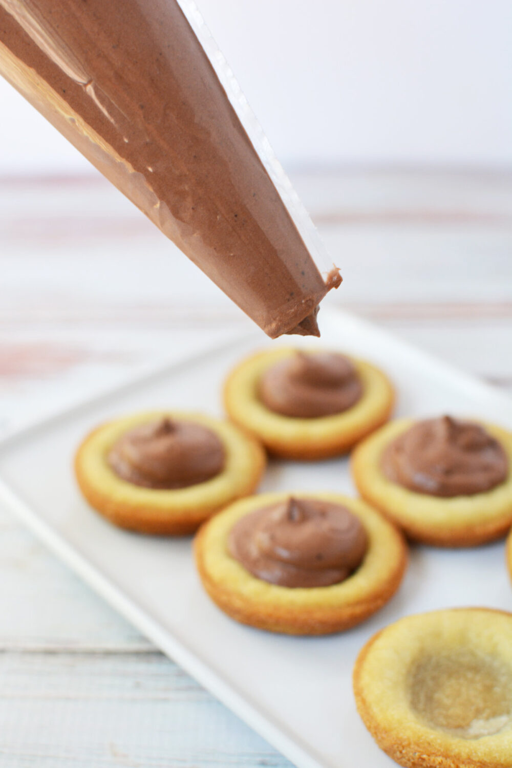 Piping bag with French silk pie filling. 