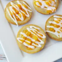 Peach pie sugar cookies with icing on top.