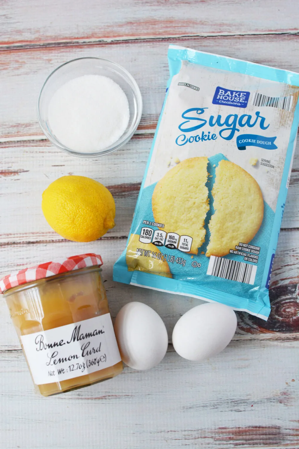 Sugar cookie dough, lemon curd, eggs, sugar, and lemon. 