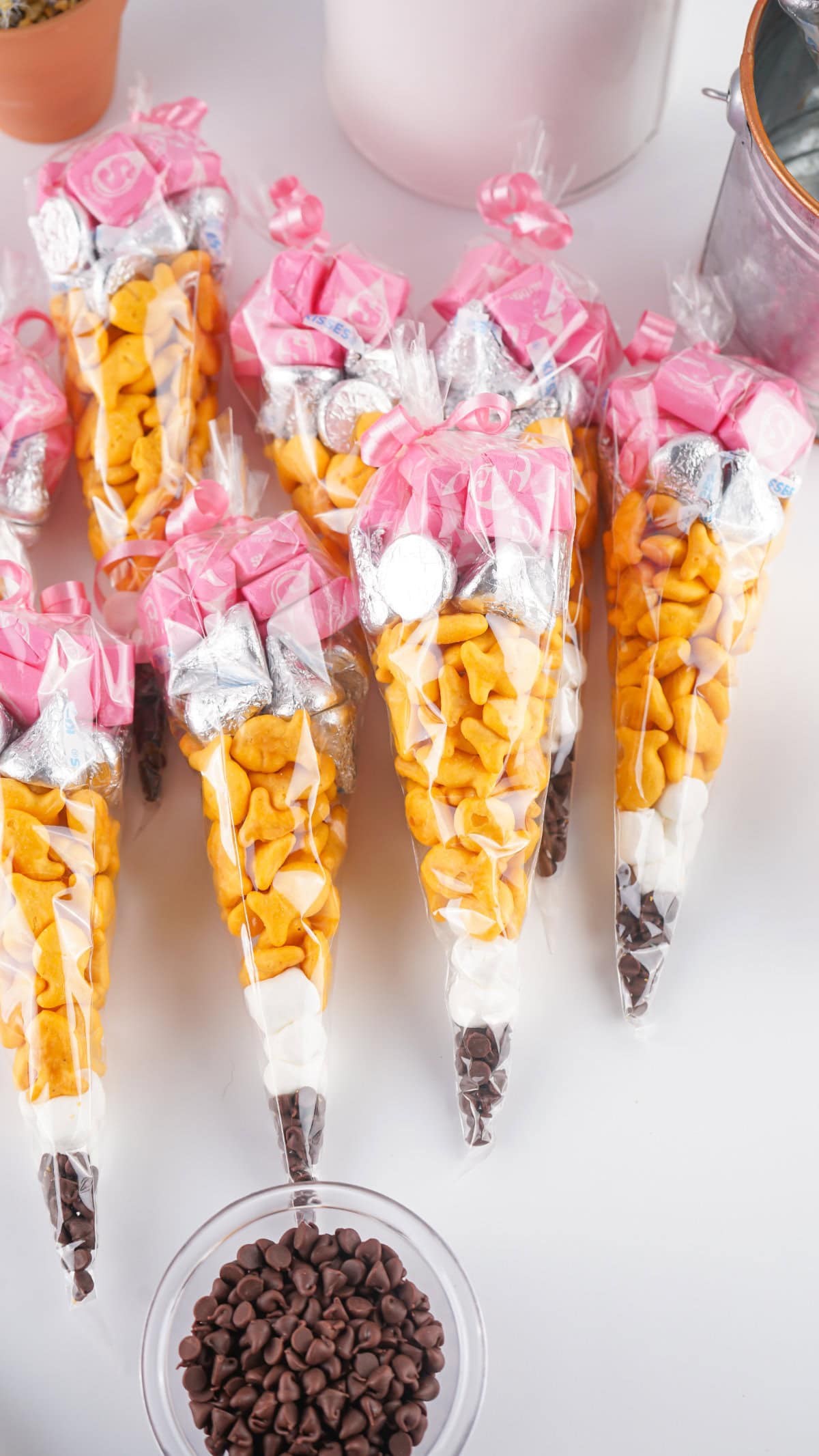 Snack bags that look like pencils lined up on a table.