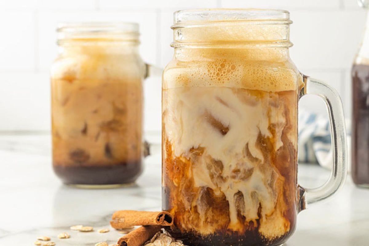 Iced cinnamon dolce latte in a mason jar.