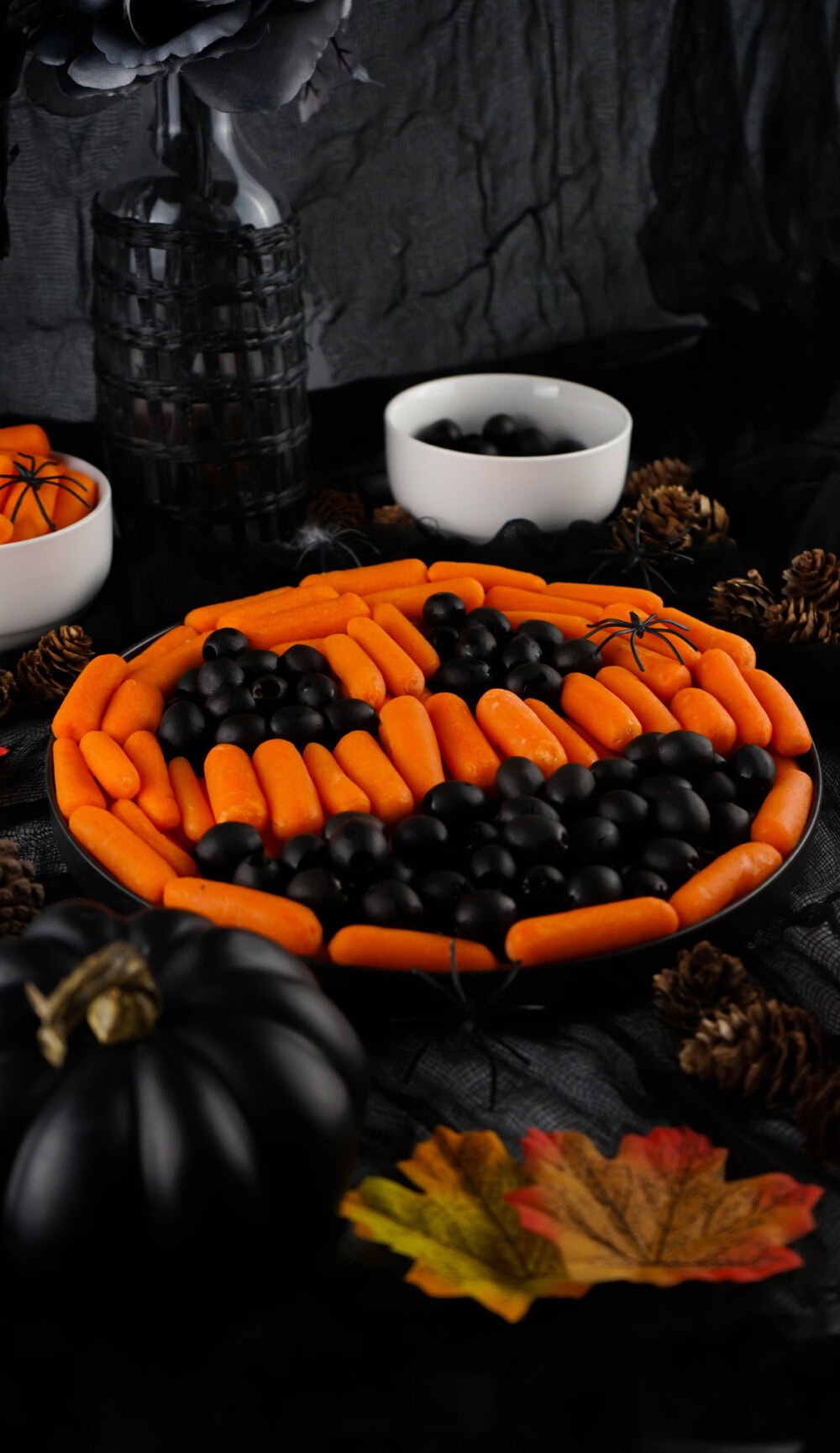 Halloween vegetable tray with carrots and olives. 