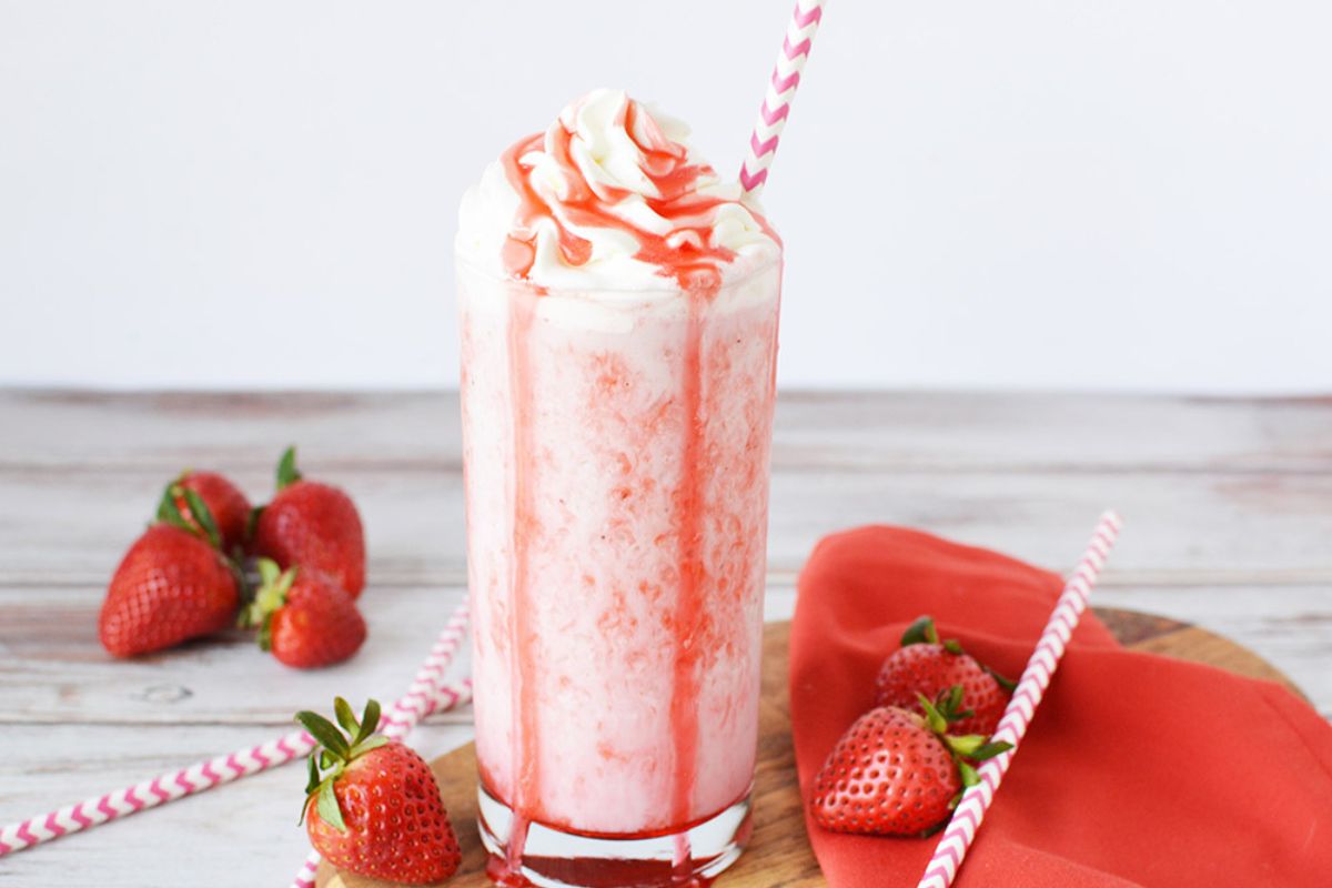 Strawberry frappuccino in a glass.