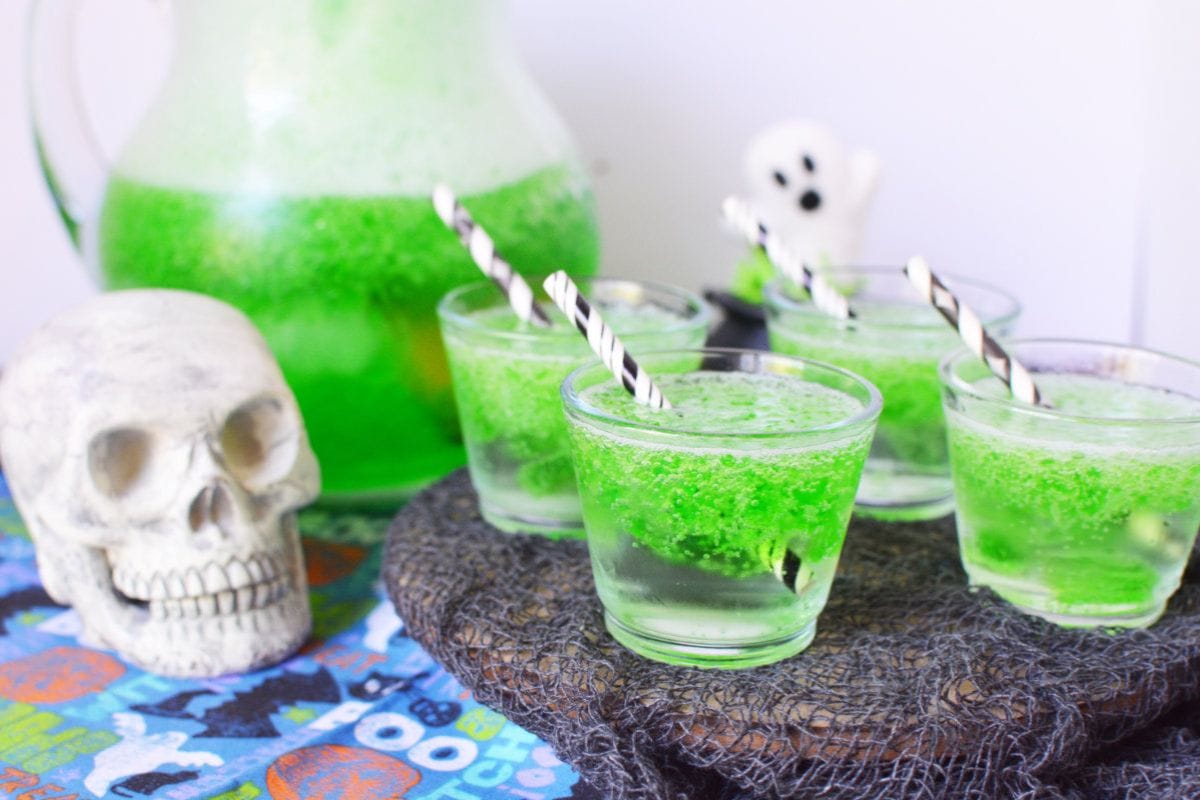 Green slimy punch next to a skull. 