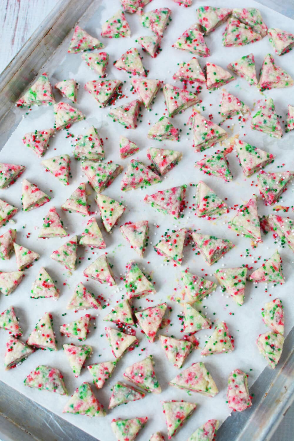 Mini elf bites shortbread cookies on a baking sheet. 