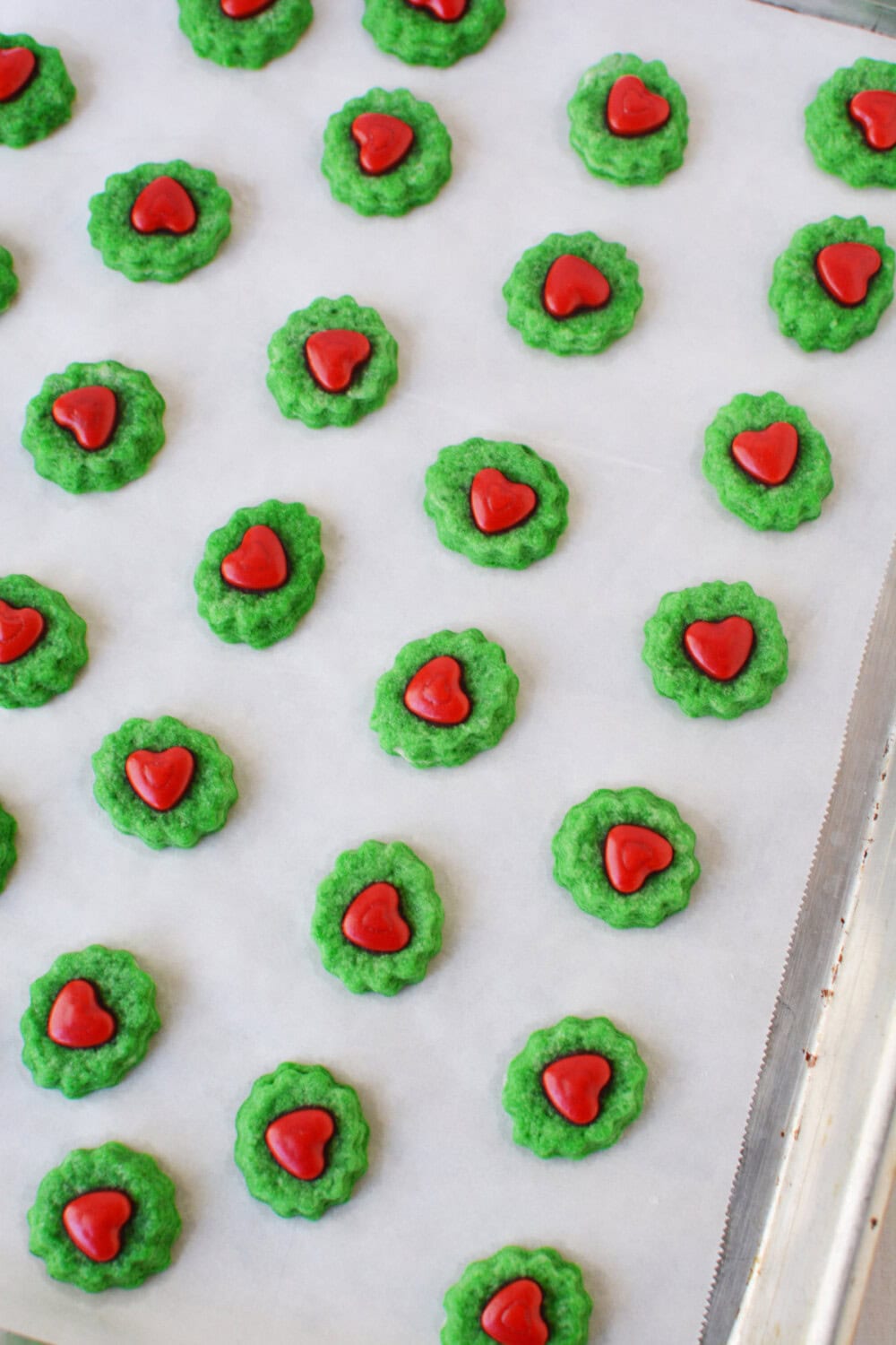 Grinch bites on a baking sheet. 