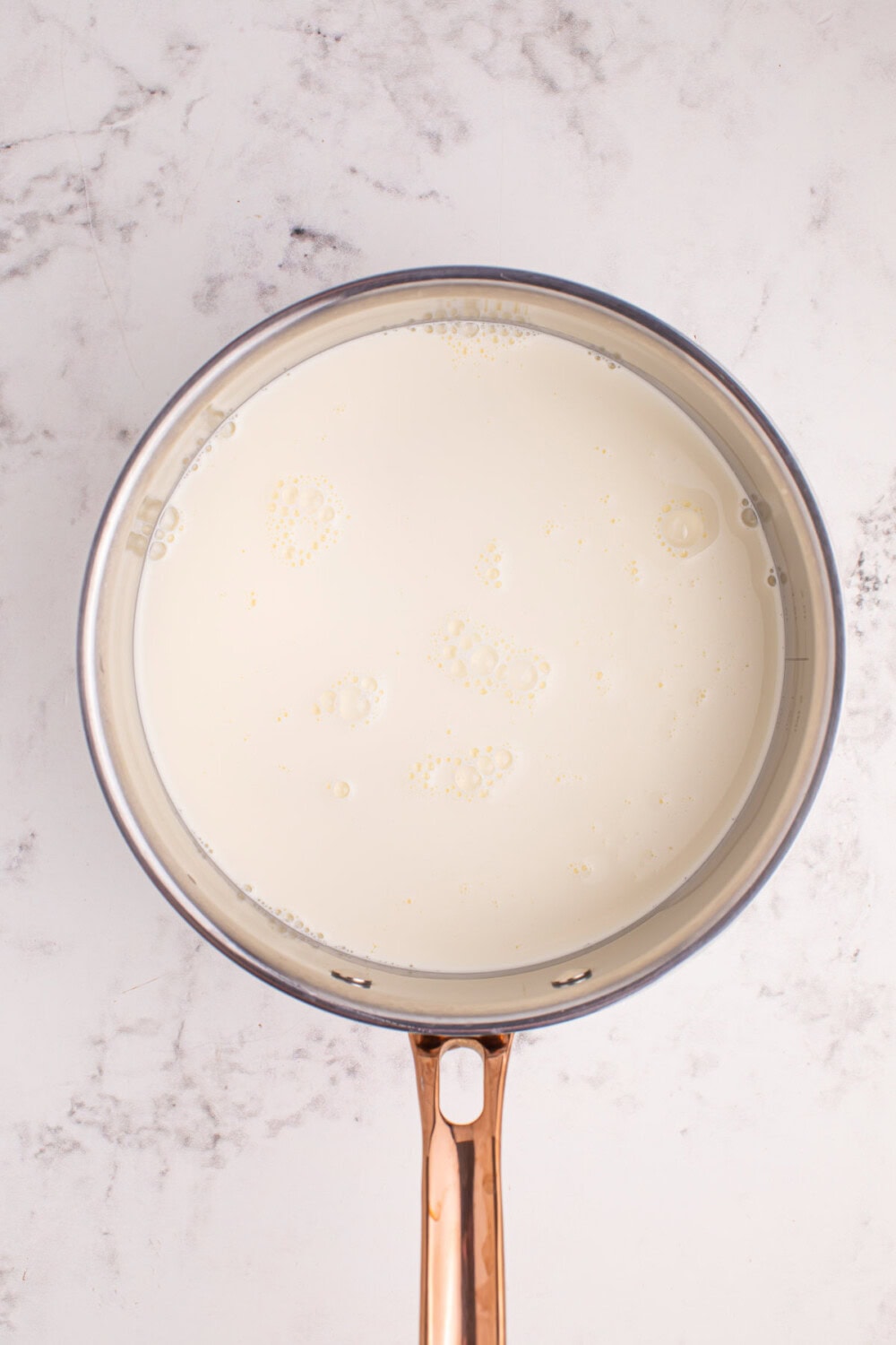 Milk and cream in a sauce pan.