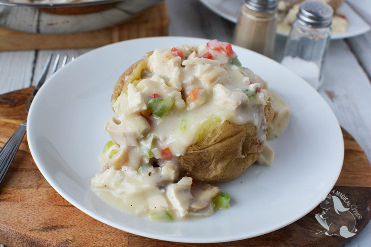 Turkey a la king on top of a baked potato.