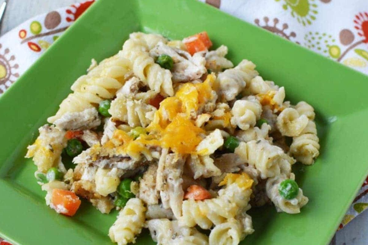 Turkey pasta bake on a green plate. 