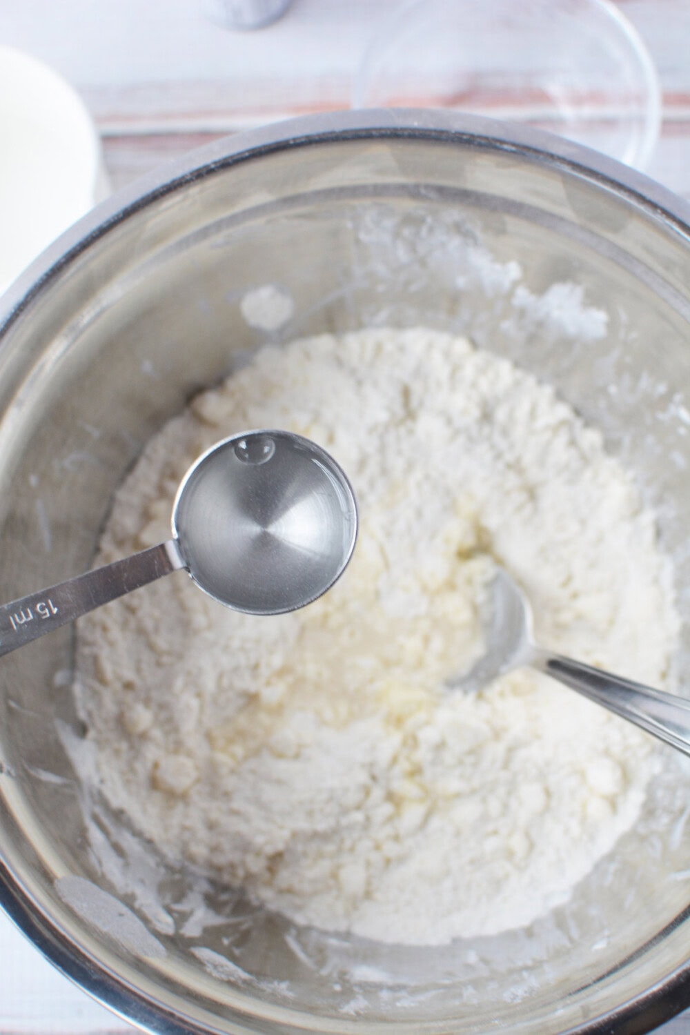 adding water to dough