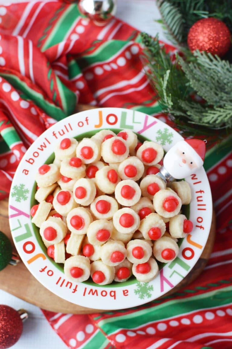 Bowl of mini shortbread cookies with red candies