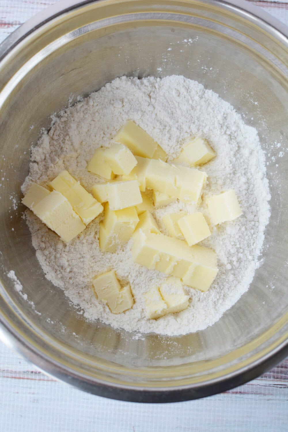 Cubes of butter in a mixing bowl