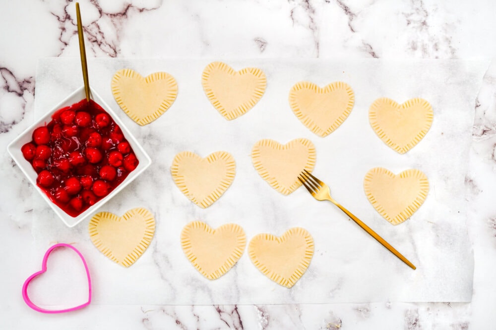 Pie crust cut into heart shapes.