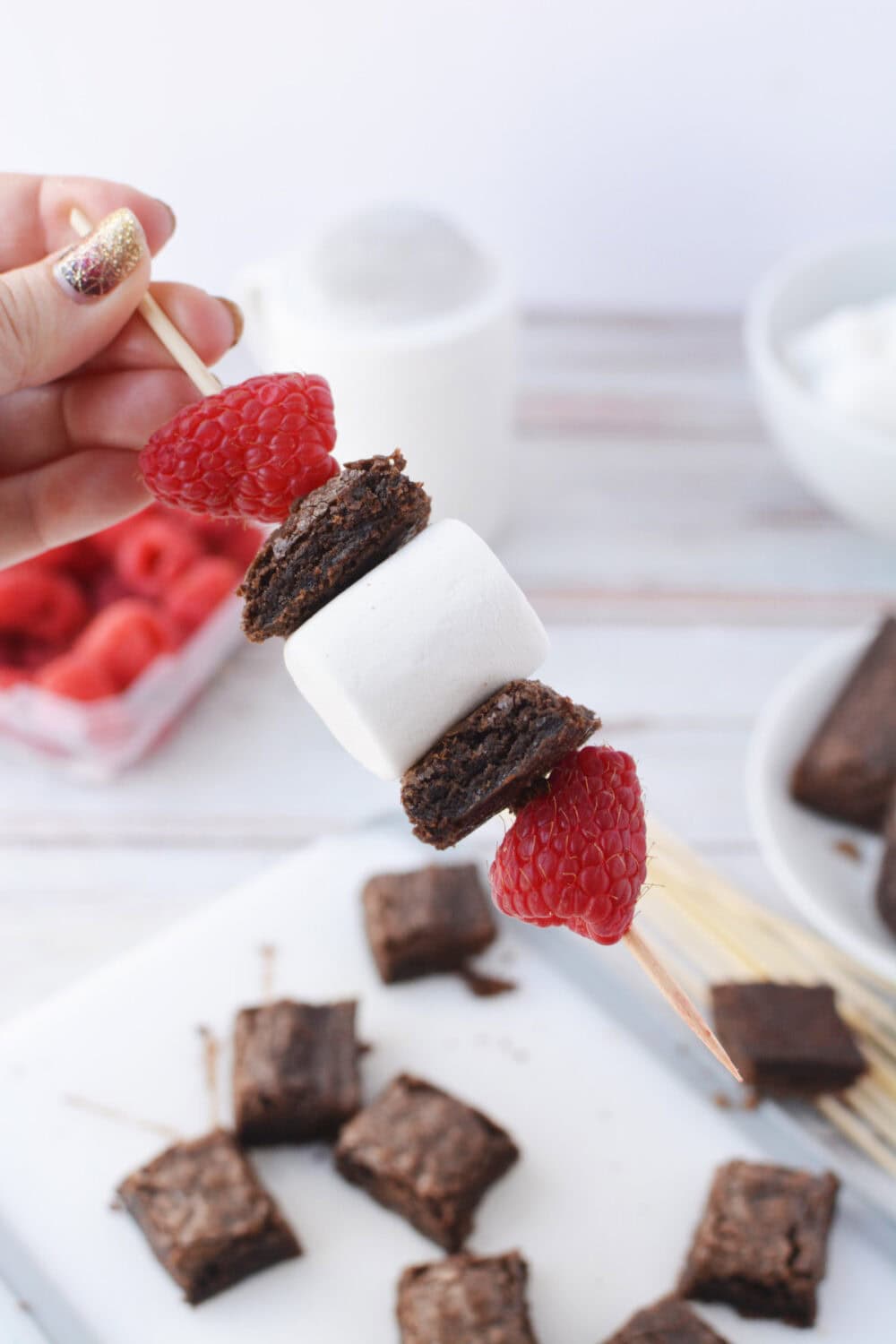 Raspberry, marshmallow, brownie dessert kabob.